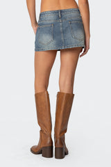 Studded Bow Distressed Denim Mini Skirt