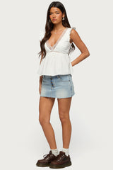 Emree Distressed Denim Mini Skirt